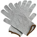 A pair of Cordova Monarch gray engineered fiber gloves with brown trim on a white background.
