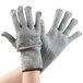 A pair of Cordova Monarch gray and white engineered fiber gloves on a white background.