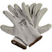 A pair of Cordova gray gloves with gray crinkle latex palms and brown trim.