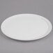 An American Metalcraft white ceramic pizza serving tray with a round rim on a gray surface.