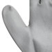A close-up of a Cordova gray nylon glove with a gray palm.
