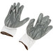 A pair of white Cordova warehouse gloves with grey nitrile-coated palms.