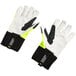A pair of lime green gloves with black and yellow trim.