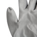 A close up of a pair of Cordova gray polyester gloves with gray polyurethane palms.