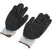 A pair of gray and black Cordova Cor-Touch foam gloves with white trim on a white background.