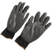 A pair of black Cordova polyester gloves with black polyurethane palms.