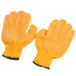 A pair of yellow Cordova grip gloves with two-sided criss-cross PVC coating and green trim.