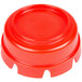A red plastic ashtray with 12 indents.