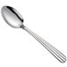 An Acopa Harmony stainless steel teaspoon with a handle on a white background.