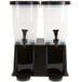 A black Choice Double plastic beverage dispenser with black stand.
