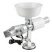 A white and silver Weston Roma food strainer machine with a white bowl on it.