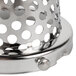 A Weston stainless steel strainer with holes.