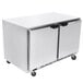 A stainless steel Beverage-Air undercounter refrigerator with two doors on wheels.