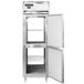 A stainless steel Continental pass-through freezer with two solid half doors.