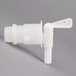A white plastic Impact vented dispensing container faucet with a handle.