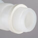 A white plastic tube with a vented faucet tip.