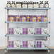 A MetroMax Q shelving unit with bottles and boxes on the shelves.