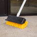 Carlisle 4042100 10" Hi-Lo Floor Scrub Brush with Squeegee Main Thumbnail 1