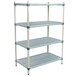 A grey MetroMax shelving unit with blue shelves and metal legs.