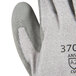 A close-up of a Cordova extra large glove with gray polyurethane coating on the palm.