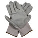 A pair of grey Cordova HPPE gloves with gray polyurethane palm coating.