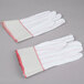 A pair of white Cordova double palm work gloves with red stripes on the cuff.