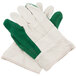 A pair of Cordova green and white work gloves.