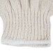 A white knit fingerless glove.