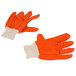 A pair of Cordova orange work gloves with a white double palm.
