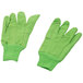 A pair of lime green Cordova jersey work gloves with red stripes on the palm.