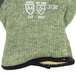 A close up of a pair of Cordova Cut Resistant gloves with green knit.