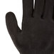 A close-up of a Cordova Sapphire Blue warehouse glove with black sandy nitrile palm coating.