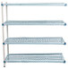 A white MetroMax Q shelving add on unit with three metal shelves and white plastic grates with black holes.