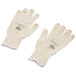 A pair of Cordova Natural Cotton Work Gloves with Blue Nitrile Palm Coating.