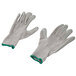 A pair of Cordova medium-sized grey work gloves with green trim and a crinkle latex palm coating.
