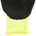 A yellow and black Cordova Monarch heavy duty work glove with black foam latex palm coating.