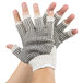 A pair of large Cordova fingerless gloves with black dots on the palms.