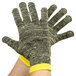 A pair of large Cordova cut resistant gloves with yellow and black stripes.