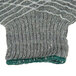 A close up of a gray knit Cordova warehouse glove.