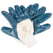 A pair of blue Cordova warehouse gloves with a blue glove on top.