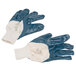 A pair of blue Cordova warehouse gloves with white jersey lining.
