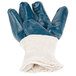 A blue Cordova warehouse glove with a white jersey lining.