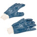 A pair of blue Cordova nitrile gloves with white palms.