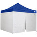 A blue and white Caravan Canopy tent set up with side walls.