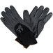 A pair of black Cordova warehouse gloves with black and gray palm coating and nitrile dots.