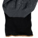 A black and gray nylon/spandex glove with black foam nitrile and polyurethane palm coating and nitrile dots.