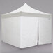 A white Caravan Canopy instant tent with two open doors.