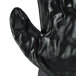 A black Cordova warehouse glove with a white background.