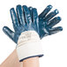 A pair of blue Cordova Nitrile gloves with a blue and white supported palm.