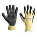 A pair of black and yellow Cordova ActivGrip Advance Kevlar gloves with black palm coating.